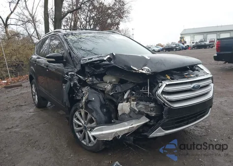 2017 Ford Escape Titanium z USA, uszkodzony, nr VIN 1FMCU0JD4HUE33758